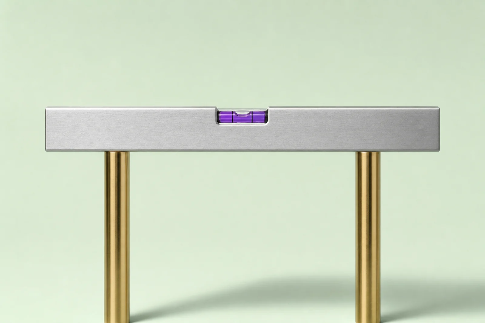 A steel ruler laid level across violet bars of differing heights, cutting every tall bar to the same standard