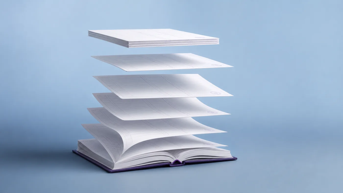 An open ledger with its pages rising into a neatly aligned stack, representing Vigor's accounting and bookkeeping services in Dubai